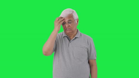 Sick-Indian-old-man-having-a-headache--Green-screen