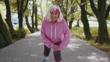 Athletic-fitness-senior-sport-runner-woman-grandmother-training-workout-cardio-in-park-at-morning