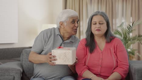 Old-Indian-husband-surprises-wife-with-a-gift