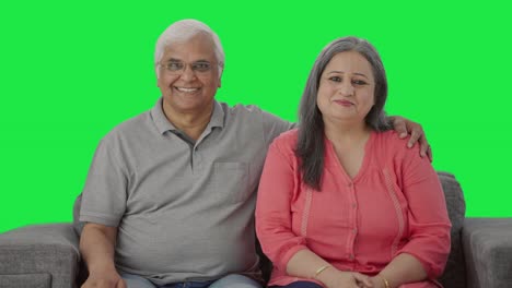 Happy-Indian-old-couple-smiling-Green-screen