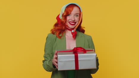 Redhead-ginger-girl-presenting-birthday-gift-box-offer-wrapped-present-career-bonus-celebrating