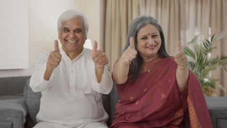 Happy-Old-Indian-couple-showing-thumbs-up