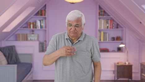 Sick-Indian-old-man-suffering-from-cold-and-cough