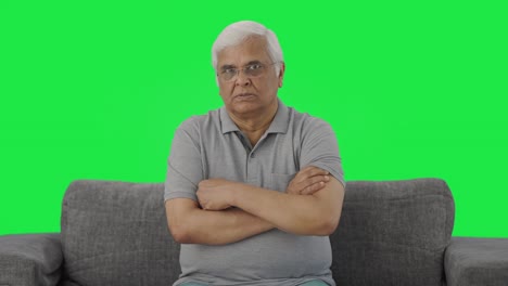 Angry-Indian-old-man-looking-at-the-camera-Green-screen