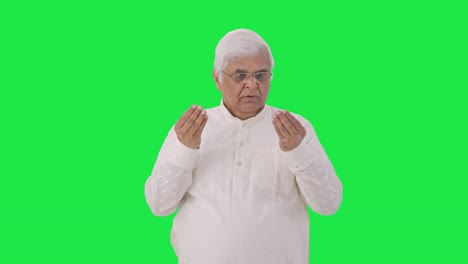 Sick-Indian-old-man-suffering-from-hairfall-Green-screen