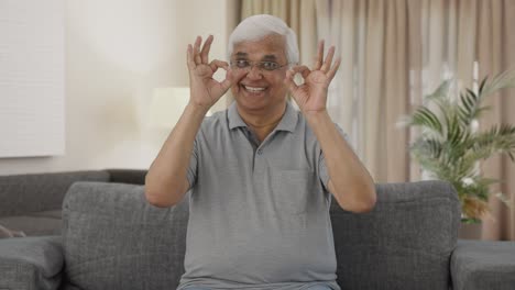 Happy-Indian-old-man-showing-okay-sign