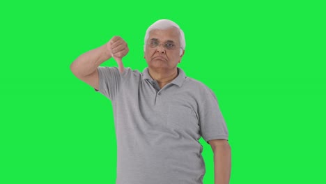 Angry-Indian-old-man-showing-thumbs-down-Green-screen