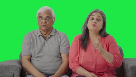 Angry-Indian-old-couple-shouting-on-someone-Green-screen