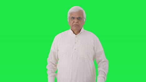 Angry-Indian-old-man-looking-at-the-camera-Green-screen