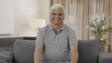 Happy-Indian-old-man-smiling-to-the-camera