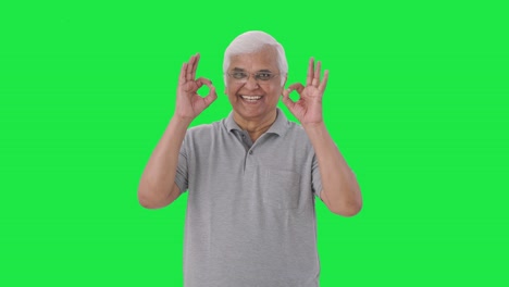 Indian-old-man-showing-okay-sign-Green-screen