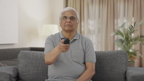 Indian-old-man-watching-TV