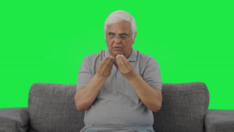 Sick-Indian-old-man-suffering-from-hairfall-Green-screen