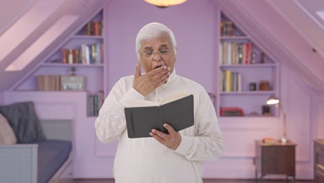 Sleepy-Indian-old-man-reading-a-book