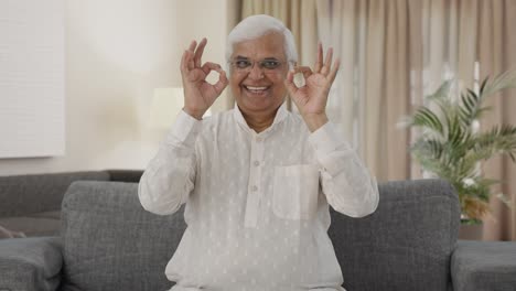 Happy-Indian-old-man-showing-okay-sign