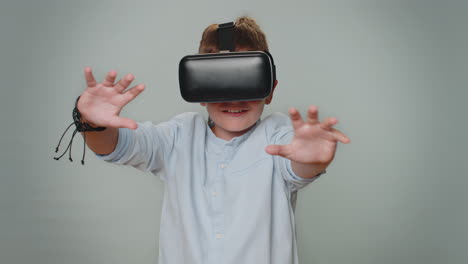 Toddler-boy-in-headset-helmet-app-to-play-simulation-realistic-game,-watching-virtual-reality-video