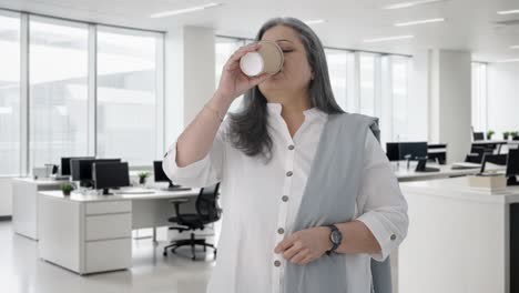 Stressed-Indian-senior-businesswoman-waiting-for-someone