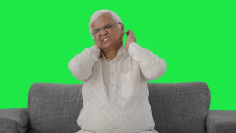 Sick-Indian-old-man-suffering-from-neck-pain-Green-screen