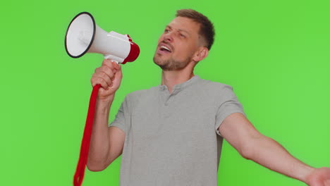 Handsome-man-loudly-scream-in-megaphone-loudspeaker-announces-advertisement-discounts-sale-Hurry-up