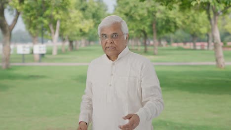 Angry-Indian-old-challenging-someone-to-fight-in-park