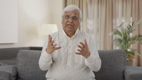 Angry-Indian-old-man-talking-to-the-camera