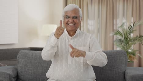 Happy-Indian-old-man-showing-thumbs-up