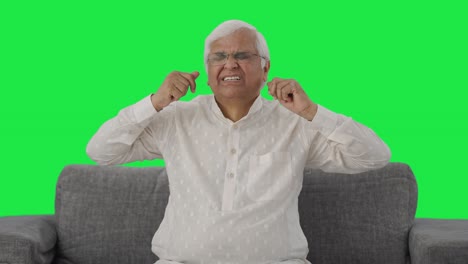 Sleepy-and-tired-Indian-old-man-yawning-and-stretching-body-Green-screen