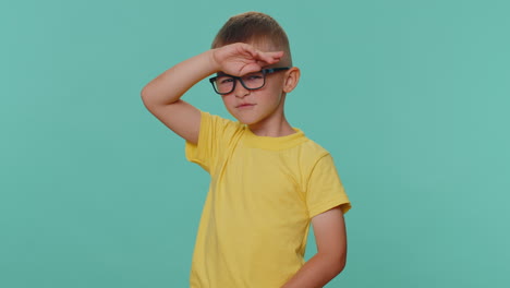 Curious-boy-kid-children-closing-eyes-with-hand-and-spying-through-fingers,-hiding-and-peeping