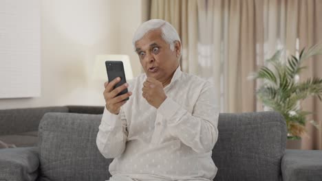 Angry-Indian-old-man-shouting-on-video-call