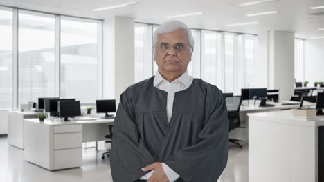 Serious-Indian-senior-lawyer-staring-to-the-camera