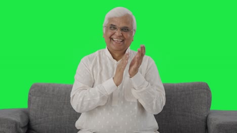 Happy-Indian-old-man-clapping-and-appreciating-Green-screen