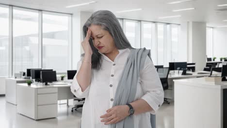 Stressed-and-tensed-Indian-senior-businesswoman