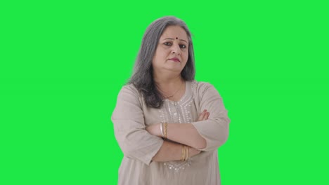 Confident-Indian-old-woman-standing-crossed-hands-Green-screen