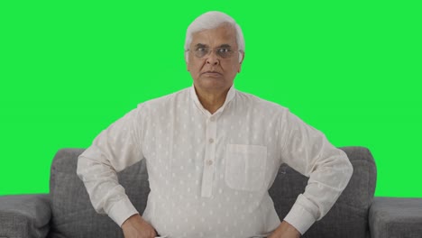 Angry-Indian-old-man-staring-at-the-camera-Green-screen