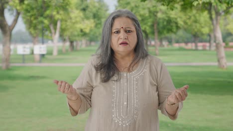 Indian-old-woman-getting-shocked-in-park