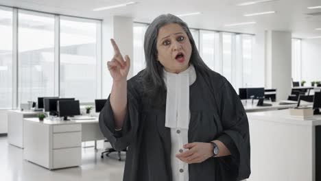 Indian-senior-female-lawyer-fighting-the-case-in-court