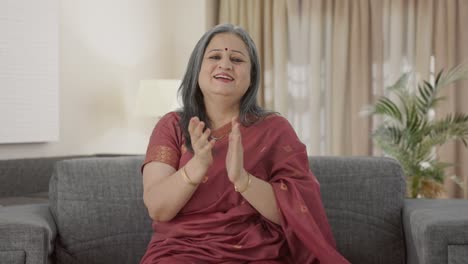 Happy-Indian-old-woman-clapping-and-appreciating