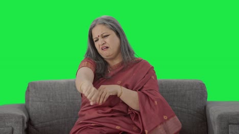 Sick-Indian-old-woman-suffering-from-arthritis-Green-screen