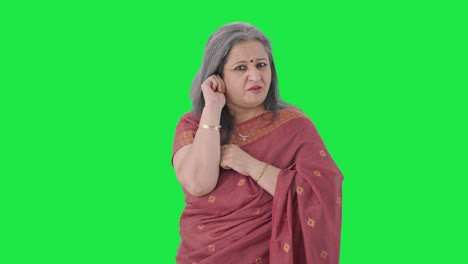 Guilty-Indian-old-woman-apologizing-and-saying-sorry-Green-screen