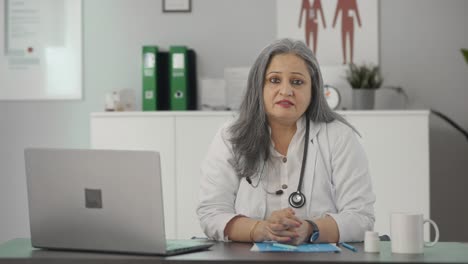 Indian-senior-female-doctor-talking-to-the-patient