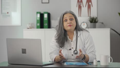 Angry-Indian-senior-female-doctor-talking-to-the-patient