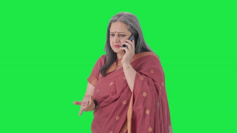 Indian-old-woman-talking-on-phone-Green-screen