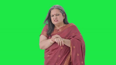 Sick-Indian-old-woman-suffering-from-arthritis-Green-screen