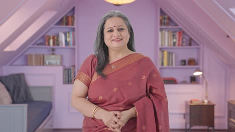 Happy-Indian-old-woman-smiling-to-the-camera