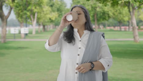 Tensed-Indian-old-woman-waiting-for-someone-in-park