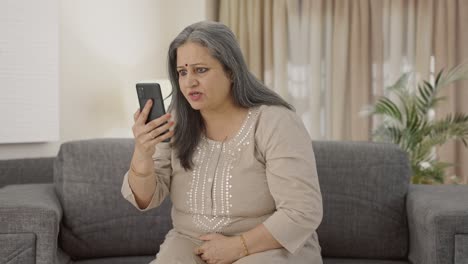 Angry-Indian-old-woman-shouting-on-video-call