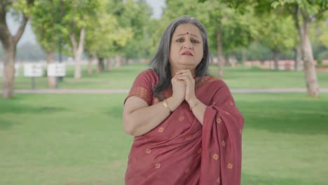 Afraid-Indian-old-woman-scared-in-park