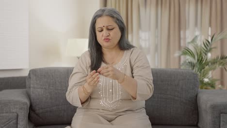 Sick-Indian-old-woman-suffering-from-hairfall