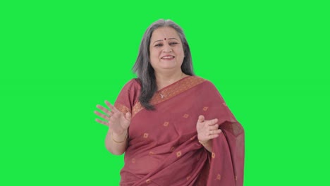 Happy-Indian-old-woman-talking-to-the-camera-Green-screen