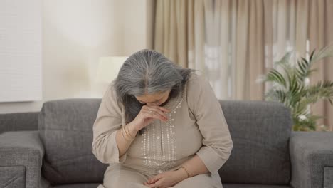 Sick-Indian-old-woman-suffering-from-cold-and-cough